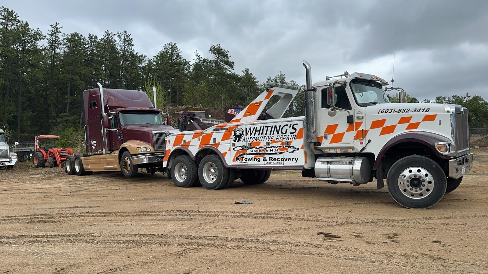 Whiting's heavy wrecker towing a semi tractor in Ossipee, NH