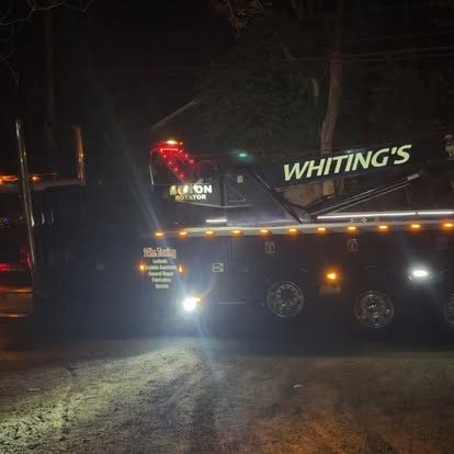 Whiting's rotator at night, boom sign lit and ROTATOR lettering on the headboard